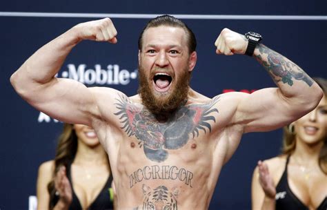 McGregor's Mascot Meltdown: MMA Fighter's Punch Shocks Fans